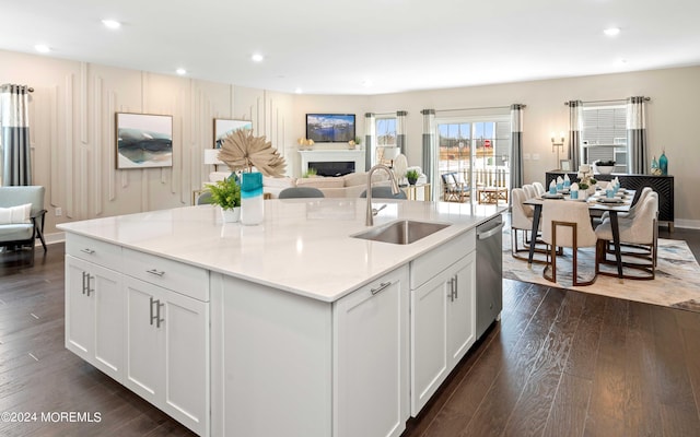 2707 Journey Ave, Marlboro, NJ 07746 - kitchen featuring a sink, open floor plan, stainless steel dishwasher, dark wood finished floors, and white cabinets