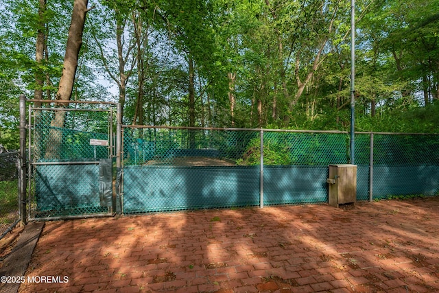 160 Pelican Rd, Middletown, NJ 07748 - view of tennis court featuring a gate