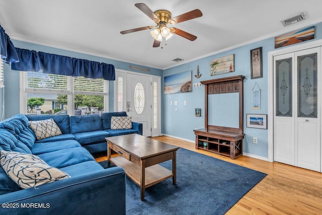 22 Franklin Ave, Hazlet, NJ 07734 - living room featuring crown molding, wood finished floors, baseboards, and ceiling fan