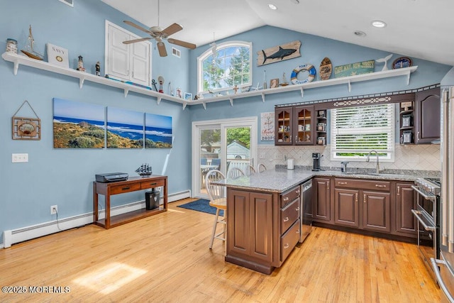 22 Franklin Ave, Hazlet, NJ 07734 - kitchen featuring stainless steel appliances, a sink, open shelves, a kitchen breakfast bar, and a peninsula