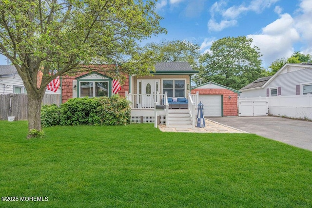 22 Franklin Ave, Hazlet, NJ 07734 - view of front of property with an outbuilding, a garage, and a deck