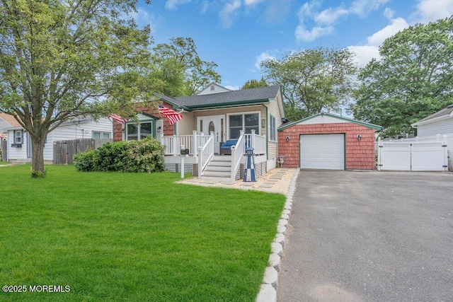 22 Franklin Ave, Hazlet, NJ 07734 - bungalow with a garage, an outbuilding, a wooden deck, and driveway