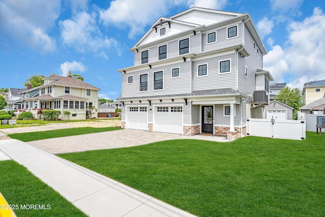 303 Forman Ave, Point Pleasant Beach, NJ 08742 - view of front of property with a gate, a garage, driveway, stone siding, and a residential view