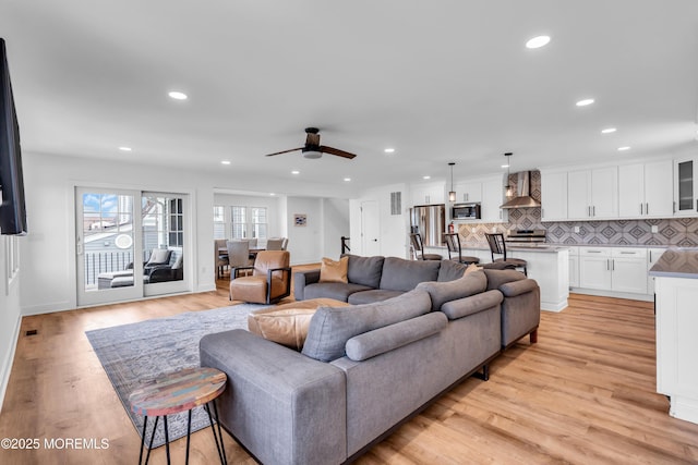 303 Forman Ave, Point Pleasant Beach, NJ 08742 - living area with light wood-style flooring, ceiling fan, recessed lighting, and baseboards