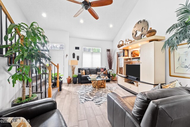 68 Winthrop Rd Unit 68B, Monroe, NJ 08831 - living room featuring recessed lighting, light wood-type flooring, a ceiling fan, stairs, and high vaulted ceiling