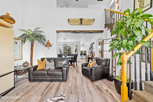 68 Winthrop Rd Unit 68B, Monroe, NJ 08831 - living area featuring stairway, a ceiling fan, wood finished floors, and a high ceiling