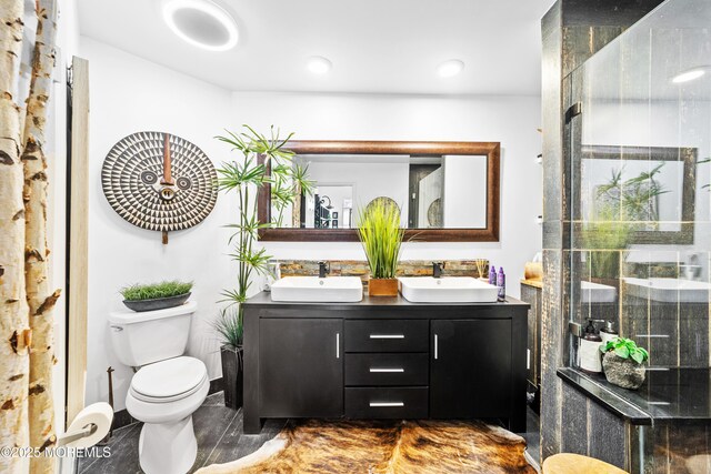 68 Winthrop Rd Unit 68B, Monroe, NJ 08831 - bathroom with double vanity, toilet, a stall shower, and recessed lighting
