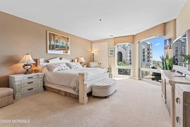 432 Ocean Blvd Unit 208, Long Branch, NJ 07740 - bedroom with light carpet and access to outside