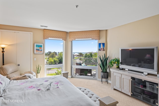 432 Ocean Blvd Unit 208, Long Branch, NJ 07740 - carpeted bedroom with access to outside and baseboards