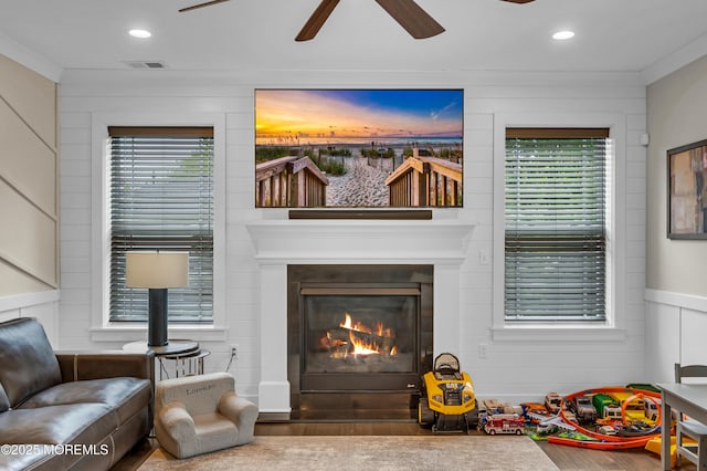804 Linden Rd, Toms River, NJ 08753 - living area with wood finished floors, a ceiling fan, a lit fireplace, recessed lighting, and plenty of natural light