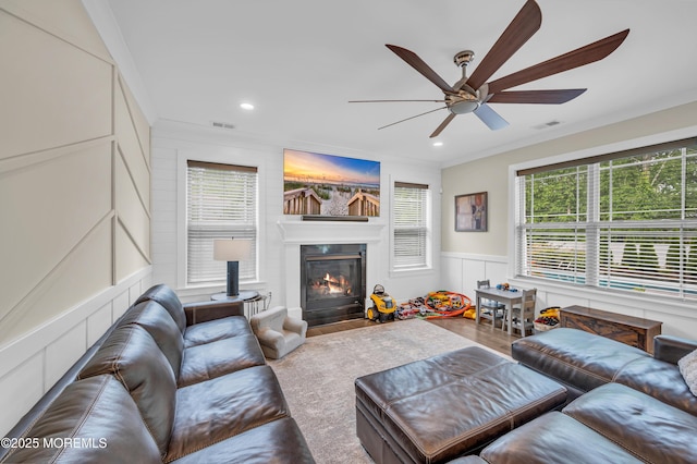 804 Linden Rd, Toms River, NJ 08753 - living room with a ceiling fan, a fireplace with flush hearth, wainscoting, recessed lighting, and crown molding