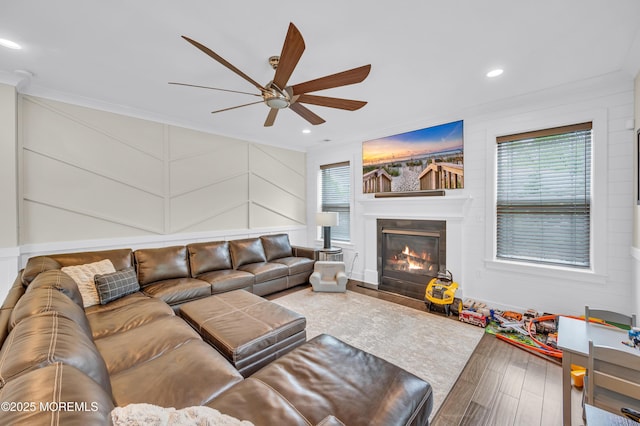 804 Linden Rd, Toms River, NJ 08753 - living room with ceiling fan, crown molding, wood finished floors, a glass covered fireplace, and recessed lighting