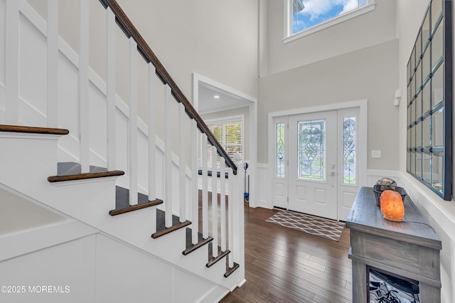 804 Linden Rd, Toms River, NJ 08753 - foyer with dark wood finished floors, stairway, a high ceiling, and a wainscoted wall