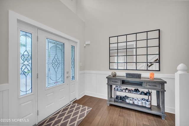 804 Linden Rd, Toms River, NJ 08753 - entrance foyer with a wainscoted wall, dark wood-style flooring, and a decorative wall