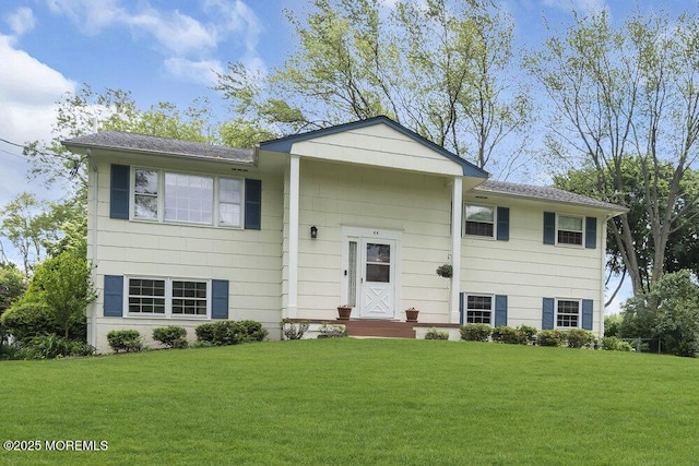 44 Hoover St, Freehold, NJ 07728 - bi-level home with a front yard and a shingled roof