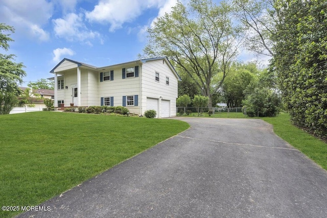 44 Hoover St, Freehold, NJ 07728 - view of front of property featuring asphalt driveway and an attached garage
