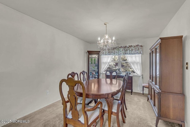 44 Hoover St, Freehold, NJ 07728 - dining area with light colored carpet and a chandelier