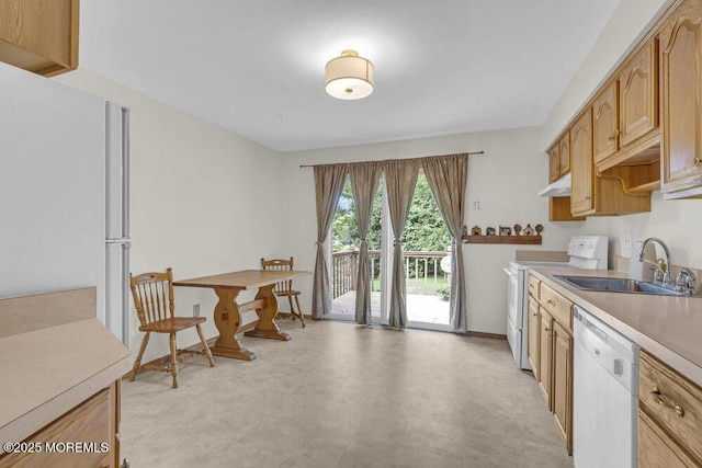 44 Hoover St, Freehold, NJ 07728 - kitchen featuring white appliances, a sink, light countertops, under cabinet range hood, and baseboards