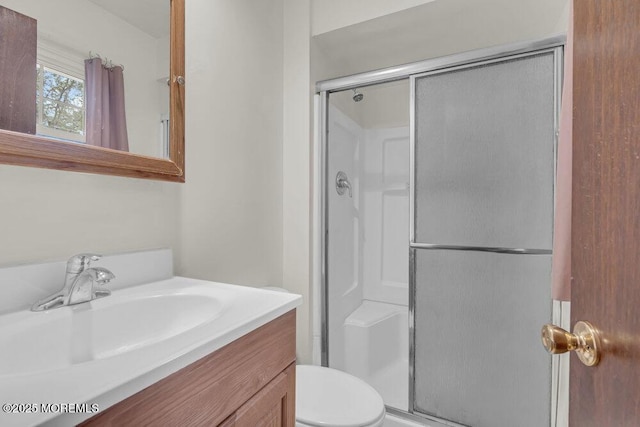 44 Hoover St, Freehold, NJ 07728 - bathroom with a shower stall, vanity, and toilet
