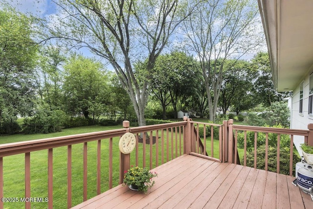 44 Hoover St, Freehold, NJ 07728 - deck featuring a lawn and view of wooded area