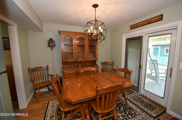 15 Tamarack St, Howell, NJ 07731 - dining room with a chandelier and light wood-type flooring