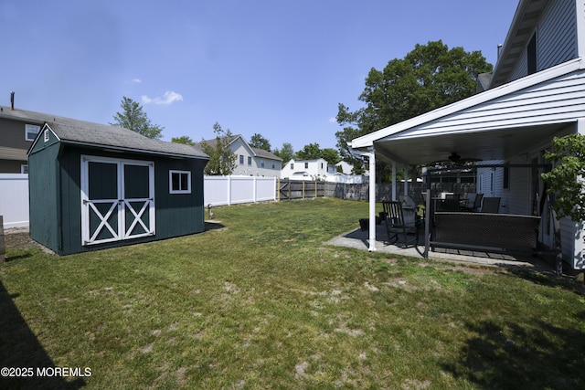 15 Tamarack St, Howell, NJ 07731 - fenced backyard with ceiling fan, a shed, and a patio