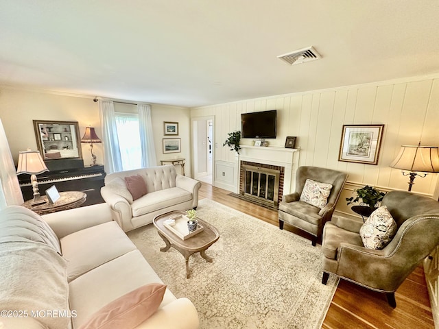 8 Spruce St, Toms River, NJ 08753 - living area with wood finished floors and a fireplace