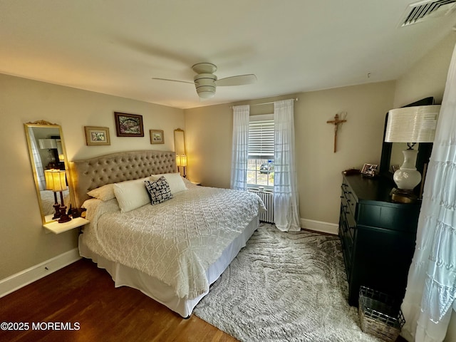 8 Spruce St, Toms River, NJ 08753 - bedroom featuring wood finished floors, baseboards, radiator, and ceiling fan