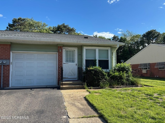 10 Monmouth Ln Unit B, Whiting, NJ 08759 - view of front of home with brick siding, a front lawn, an attached garage, driveway, and roof with shingles