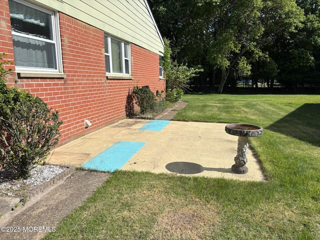 10 Monmouth Ln Unit B, Whiting, NJ 08759 - view of grassy yard with a patio and a fire pit