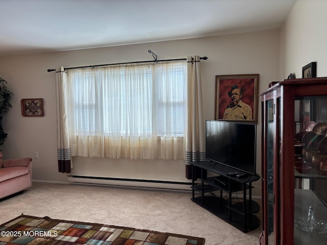 10 Monmouth Ln Unit B, Whiting, NJ 08759 - living area with a baseboard heating unit and carpet floors