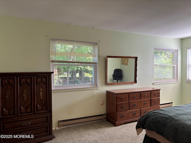 10 Monmouth Ln Unit B, Whiting, NJ 08759 - bedroom with a baseboard heating unit and light colored carpet