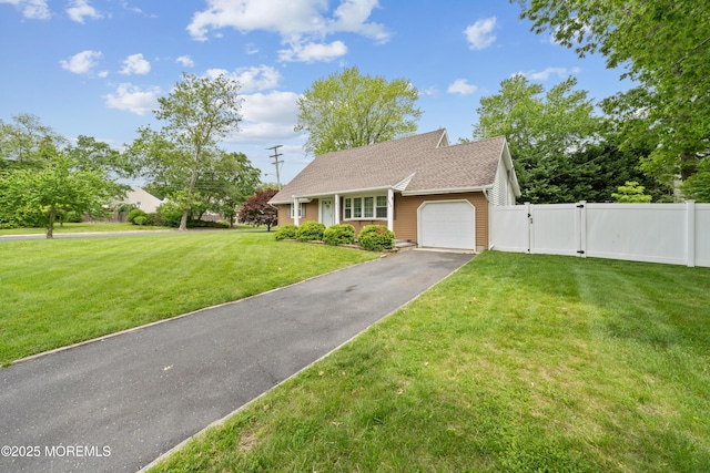 952 Stafford Dr, Toms River, NJ 08753 - view of front facade featuring a gate, a garage, and asphalt driveway
