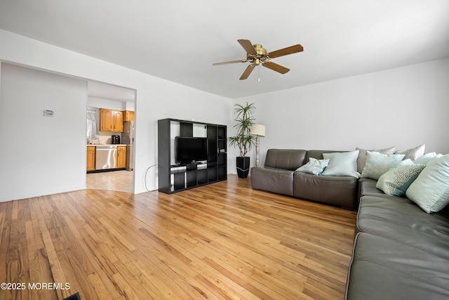 952 Stafford Dr, Toms River, NJ 08753 - living area with ceiling fan and light wood-style floors