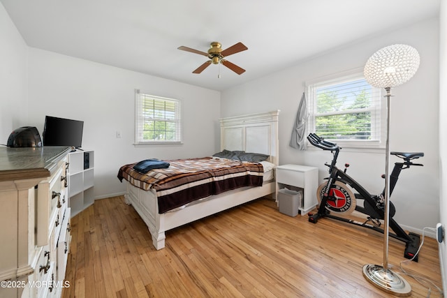 952 Stafford Dr, Toms River, NJ 08753 - bedroom with multiple windows, light wood-style flooring, baseboards, and ceiling fan