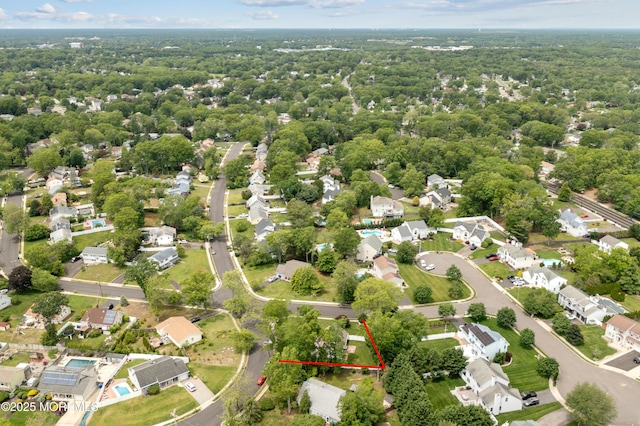 952 Stafford Dr, Toms River, NJ 08753 - aerial view of residential area with property boundaries highlighted and a heavily wooded area
