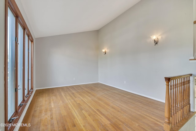 26 Nevada Dr, Hazlet, NJ 07730 - empty room featuring light wood-type flooring, baseboards, and lofted ceiling