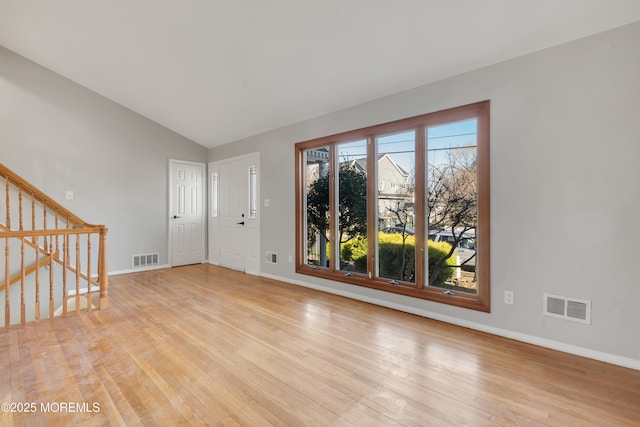 26 Nevada Dr, Hazlet, NJ 07730 - entryway featuring light wood-style floors, lofted ceiling, and baseboards