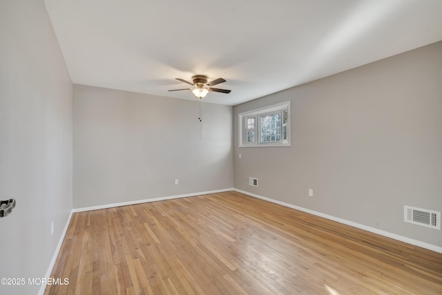 26 Nevada Dr, Hazlet, NJ 07730 - spare room with ceiling fan, light wood-type flooring, and baseboards