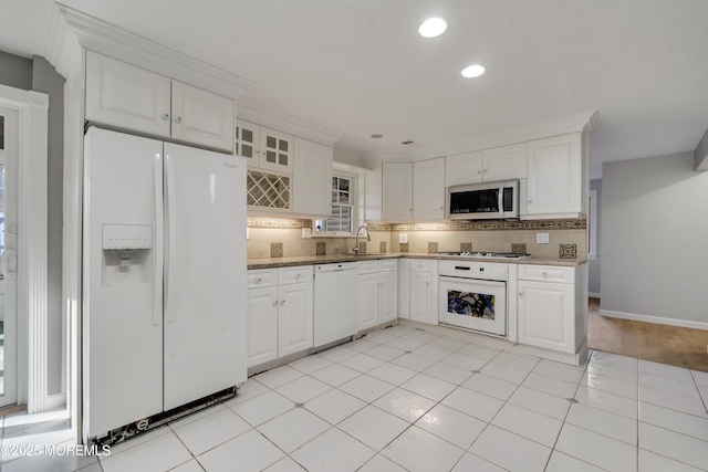26 Nevada Dr, Hazlet, NJ 07730 - kitchen featuring white appliances, tasteful backsplash, a sink, white cabinets, and recessed lighting