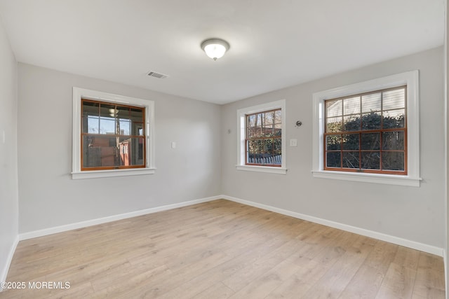 26 Nevada Dr, Hazlet, NJ 07730 - spare room featuring light wood-style flooring and baseboards