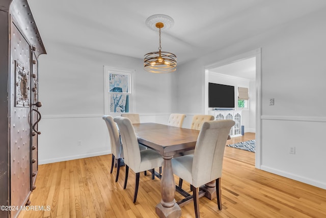 137 Church St, Fair Haven, NJ 07704 - dining area with light wood finished floors and a chandelier