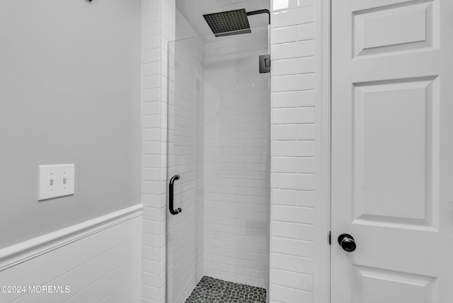 137 Church St, Fair Haven, NJ 07704 - bathroom featuring a stall shower and wainscoting