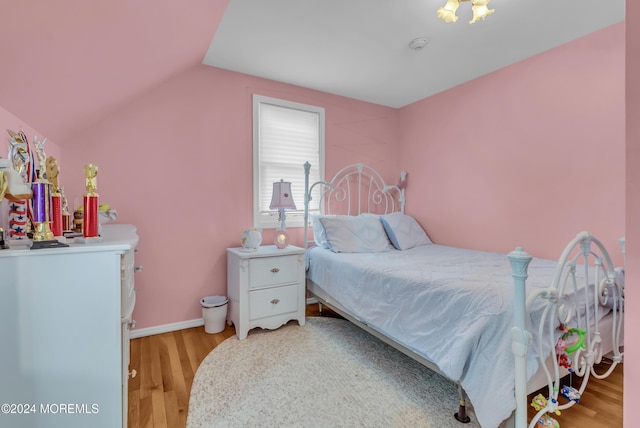 137 Church St, Fair Haven, NJ 07704 - bedroom with lofted ceiling and light wood-type flooring