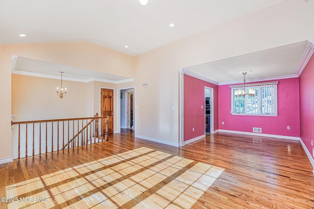 18 Croman Ct, Hazlet, NJ 07730 - spare room with a chandelier, wood finished floors, crown molding, and vaulted ceiling