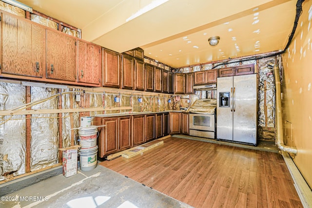 18 Croman Ct, Hazlet, NJ 07730 - kitchen featuring appliances with stainless steel finishes, light wood-type flooring, under cabinet range hood, and brown cabinets