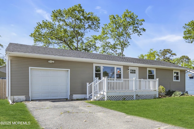 1624 Joffre Rd, Forked River, NJ 08731 - single story home featuring a front lawn, a porch, a garage, and asphalt driveway