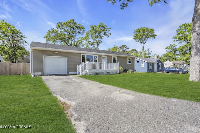 1624 Joffre Rd, Forked River, NJ 08731 - ranch-style house featuring a garage, asphalt driveway, and a wooden deck