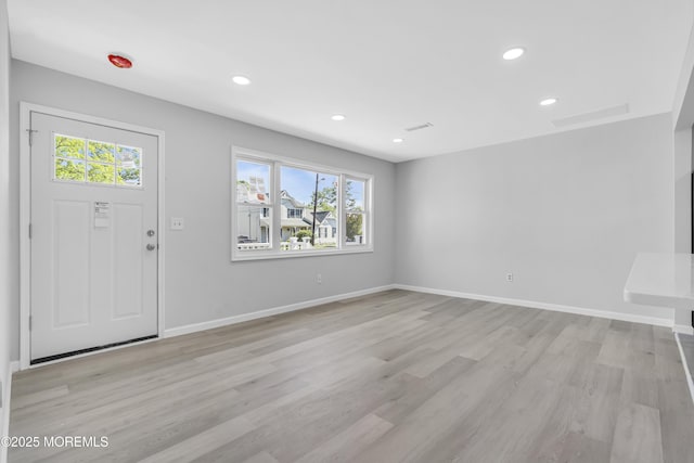 1624 Joffre Rd, Forked River, NJ 08731 - foyer entrance with plenty of natural light, recessed lighting, light wood-style flooring, and baseboards