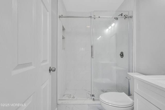 1624 Joffre Rd, Forked River, NJ 08731 - full bath with marble look tiles, a stall shower, toilet, and vanity